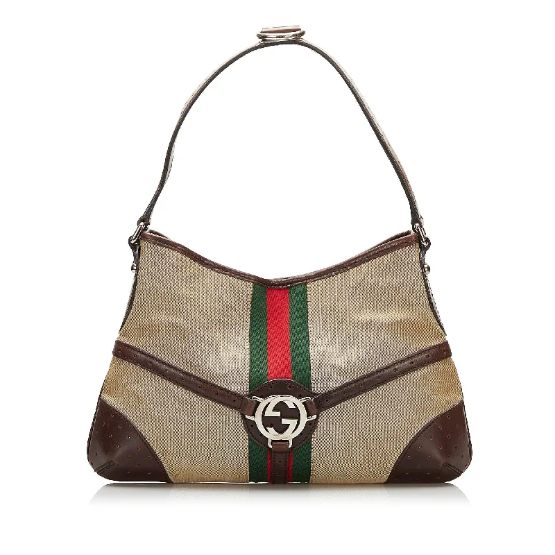 Ladies Gucci shoulder bags with a tassel decorationGucci Reins Web Shoulder Bag