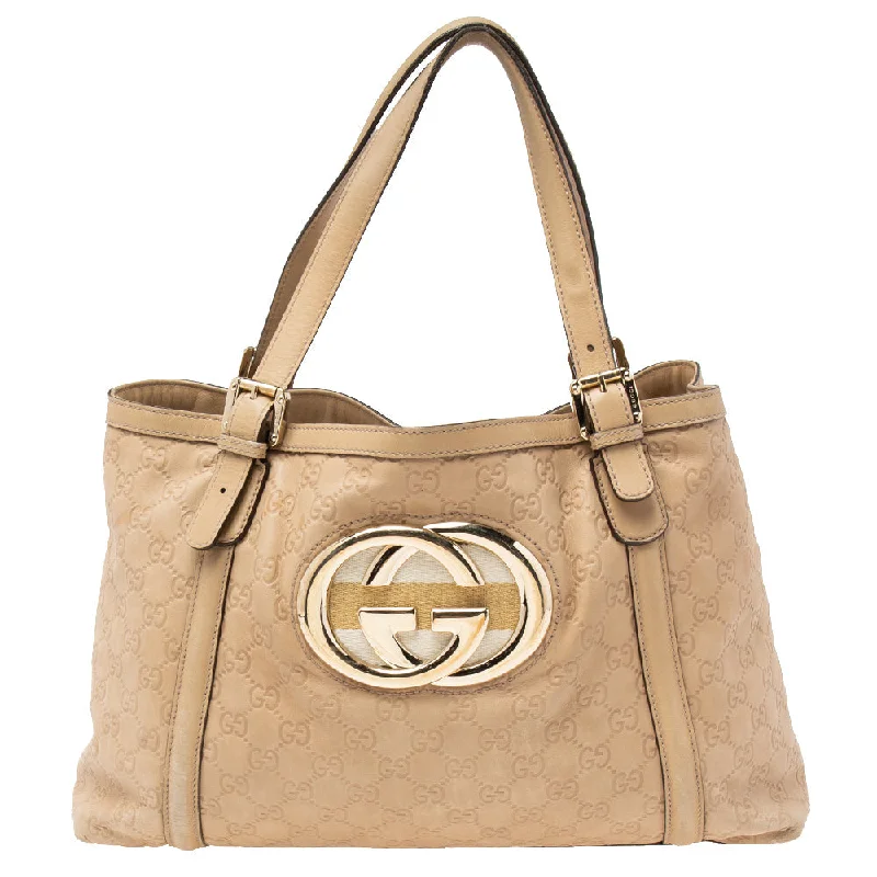 Gucci handbags for women with a patent - leather finishGucci Beige Guccissima Leather Medium GG Britt Tote