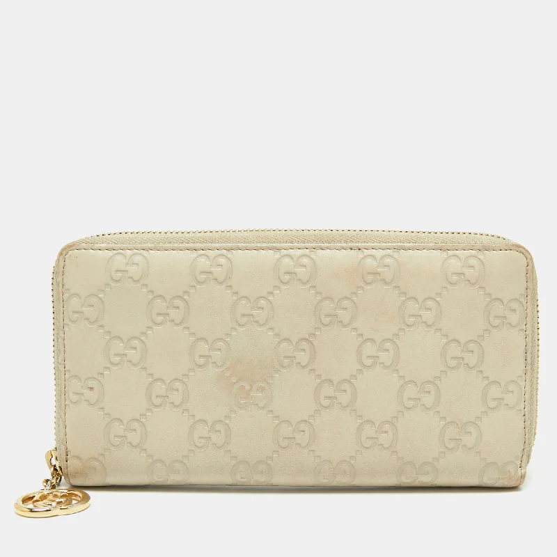 Ladies Gucci Dionysus bags with a detachable shoulder strapGucci Beige Guccissima Leather Zip Around Wallet