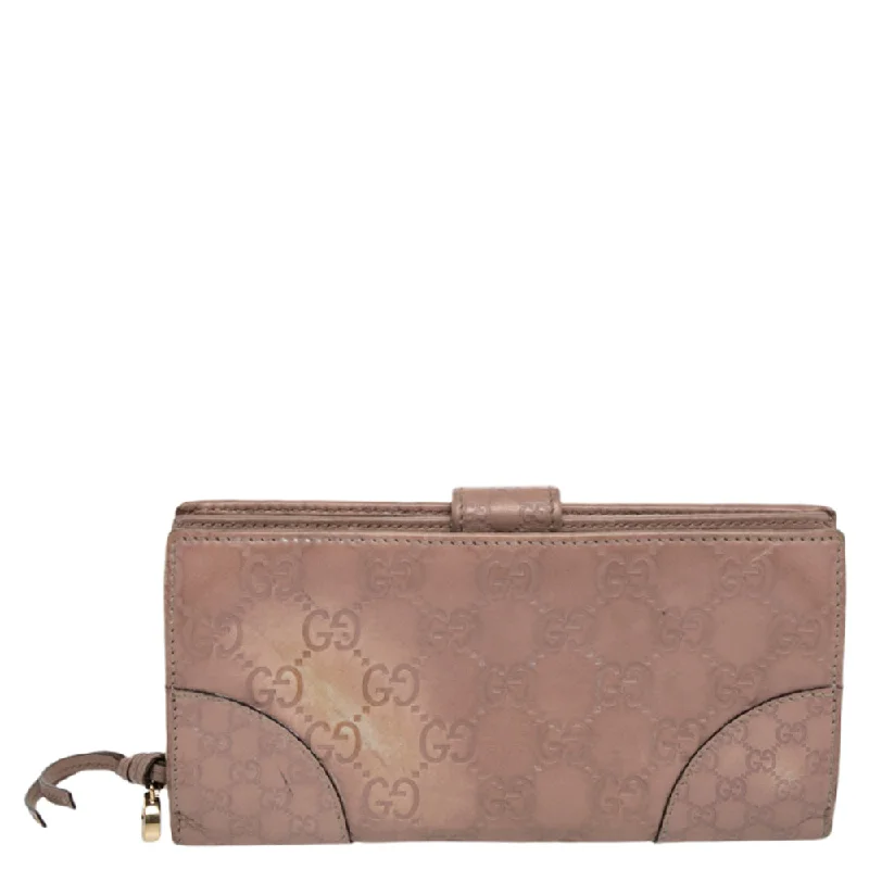 Gucci backpacks for women with a hidden back pocketGucci Beige Guccissima Leather Bree Bifold Wallet