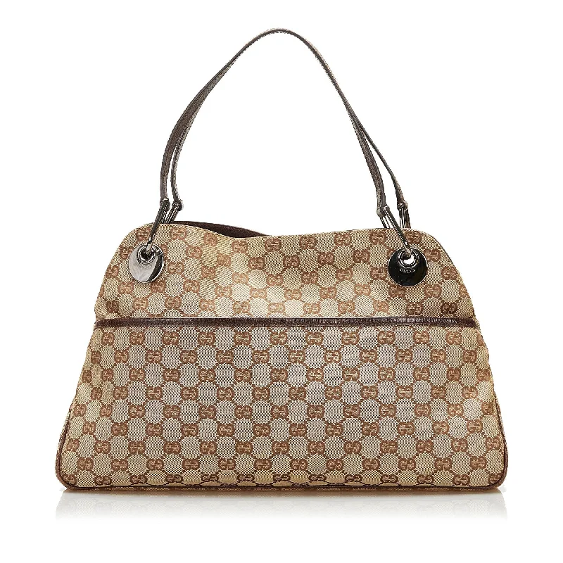 Women Gucci bags with a detachable mobile phone holderGucci GG Canvas Eclipse Tote