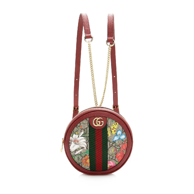 Women Gucci bags with a snap - button closure and a decorative charmGucci GG Supreme Flora Round Mini Backpack