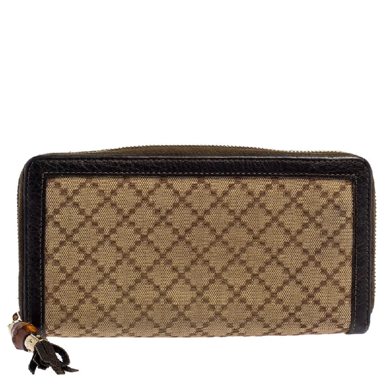 Women Gucci bags with a chain - link trim and a leather bodyGucci Beige/Brown Diamante Canvas and Leather Bamboo Tassel Zip Around Wallet