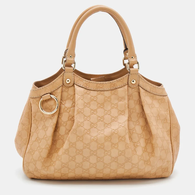 Women Gucci bags with a front - zip pocket for small itemsGucci Beige Guccissima Leather Medium Sukey Tote