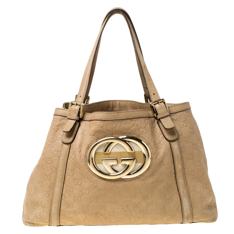 Gucci backpacks for women with a sleek silhouetteGucci Beige Leather Medium GG Britt Tote