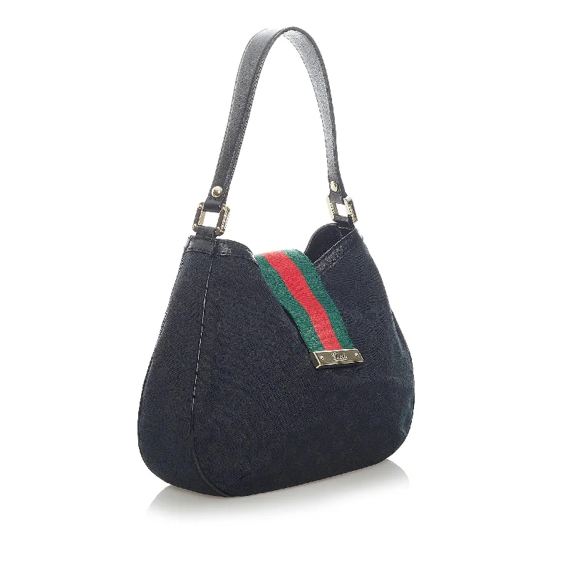 Women Gucci bags with a snap - button closure and a decorative charmGucci GG Canvas New Ladies Web Shoulder Bag (33580)