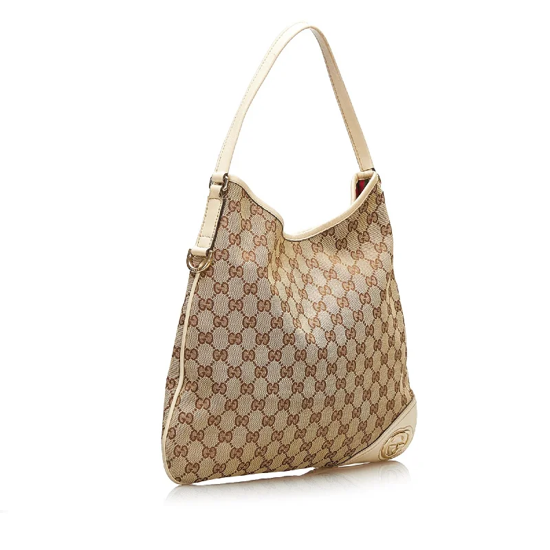 Gucci Marmont bags for women with gold - toned hardwareGucci GG Canvas New Britt Shoulder Bag (35620)